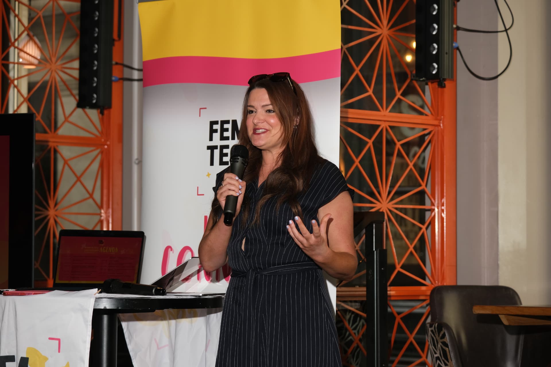 Speaker on stage at the 2026 Women in Tech London Summit
