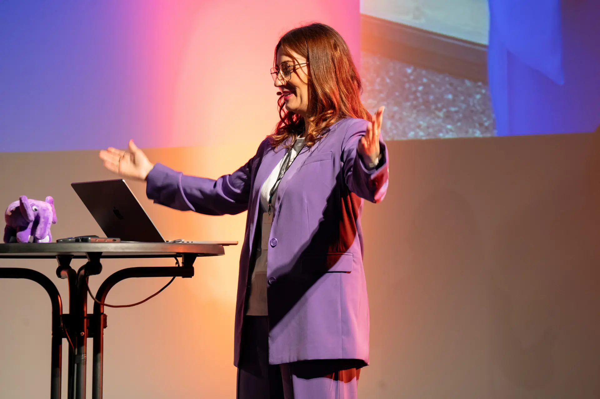 Speaker on stage at the summit